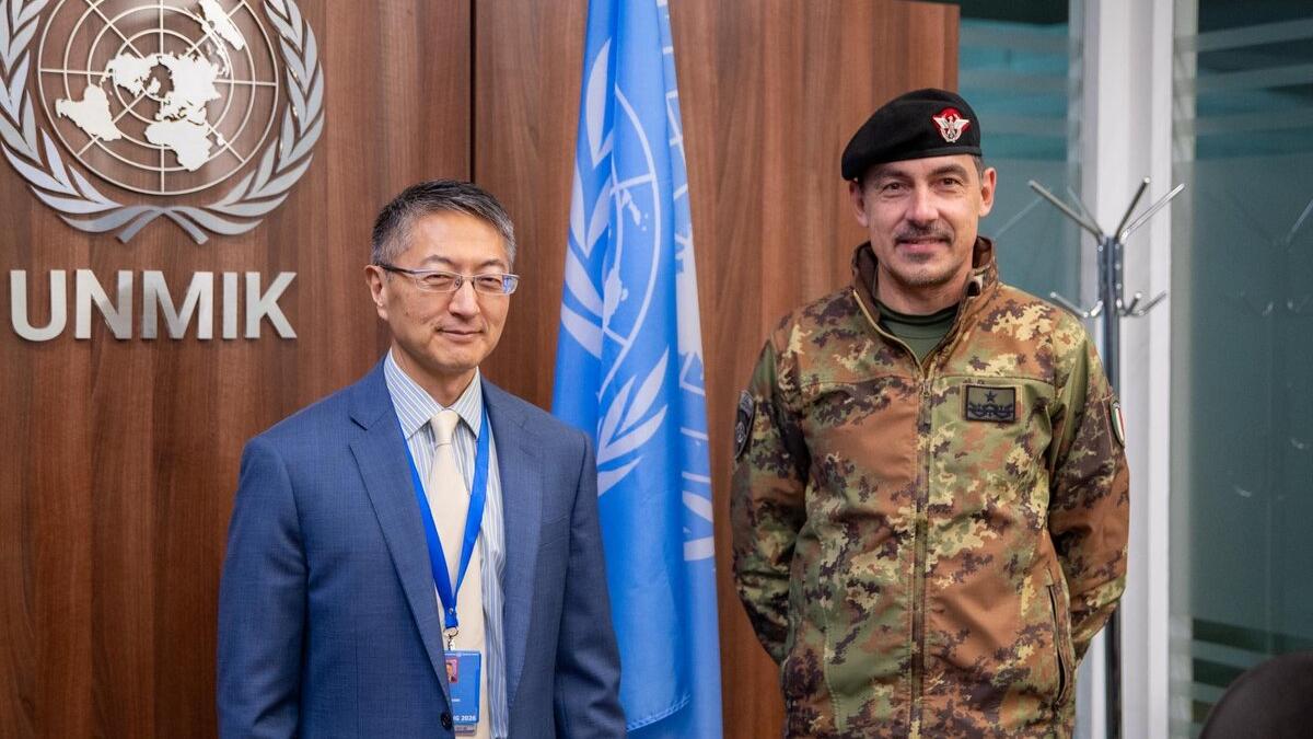 UNMIK Deputy Special Representative of the Secretary-General and Officer in Charge Milbert Dongjoon Shin standing beside the incoming Deputy Commander of KFOR, Brigadier General Federico Collina, at UNMIK Headquarters. UNMIK Deputy Special Representative of the Secretary-General and Officer in Charge Milbert Dongjoon Shin standing beside the incoming Deputy Commander of KFOR, Brigadier General Federico Collina, at UNMIK Headquarters.