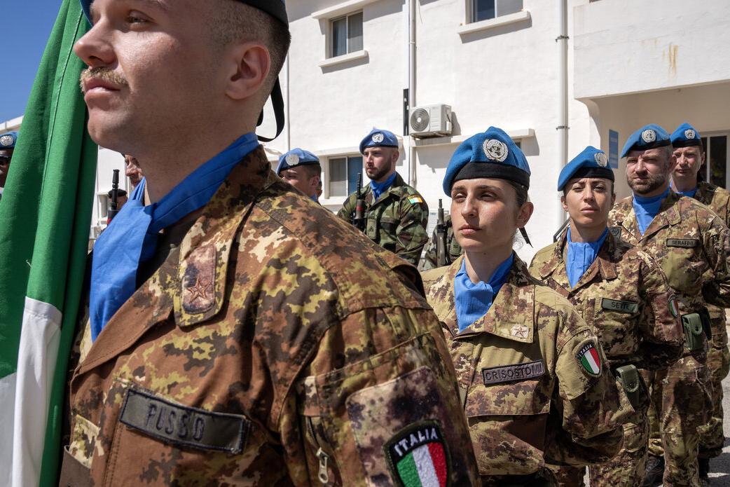 Peacekeepers stand in a line.